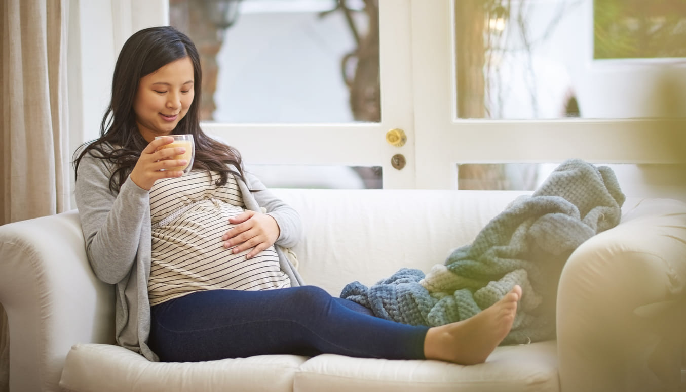 pregnant woman on couch