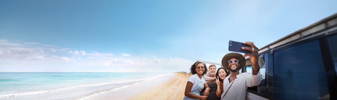 group of friends on the beach in Australia