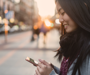 yound woman using app on moble phone
